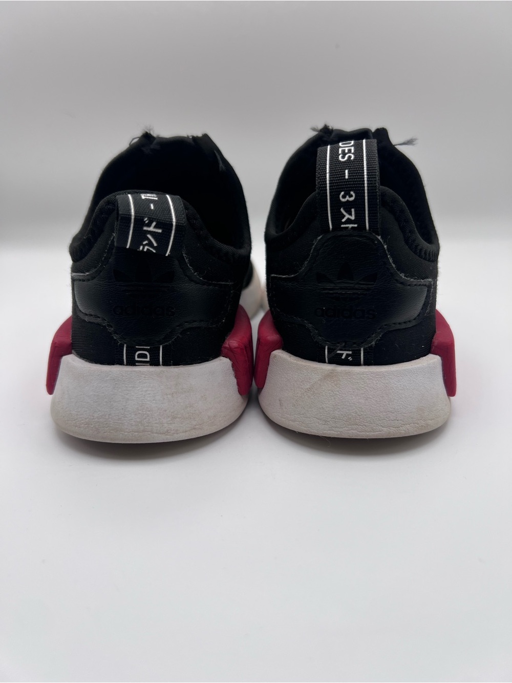 adidas NMB Kids Black Slip-On Sneakers with Blue & Red Midsole Accent - Picture 6 of 9